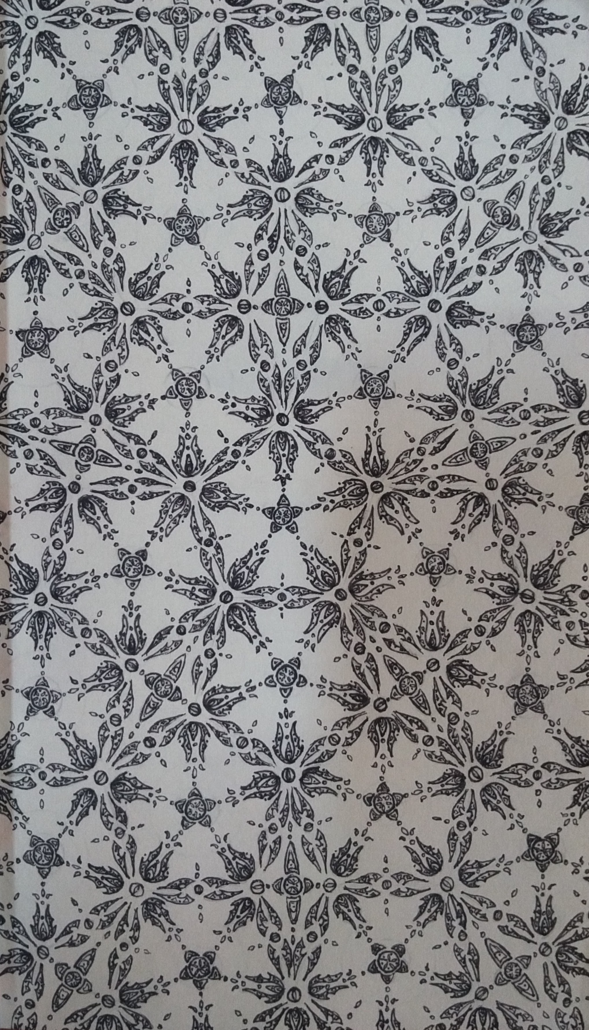an ornate pattern laid over tessellating pentagons and diamonds