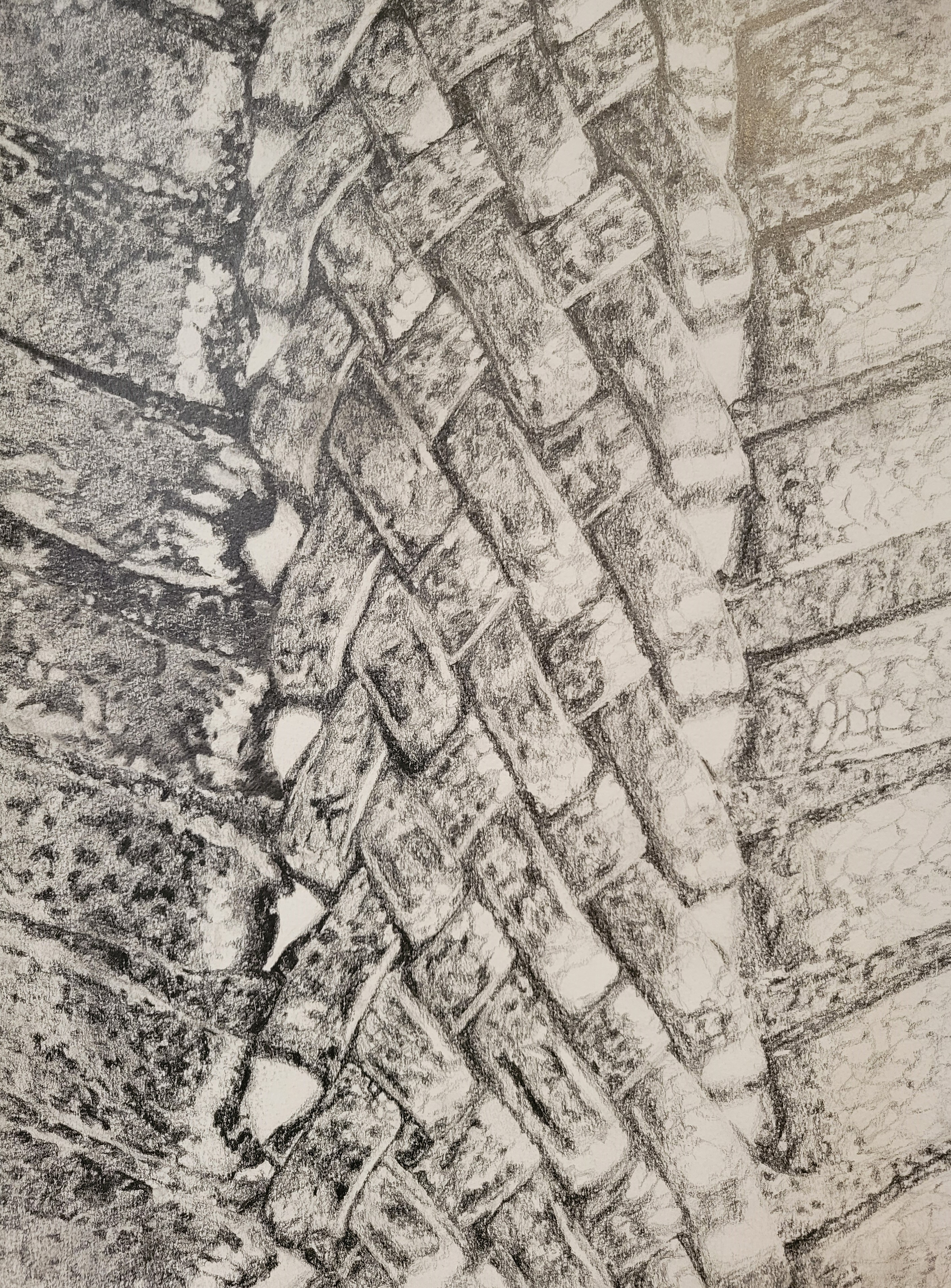 A close up sketch of a braided belt