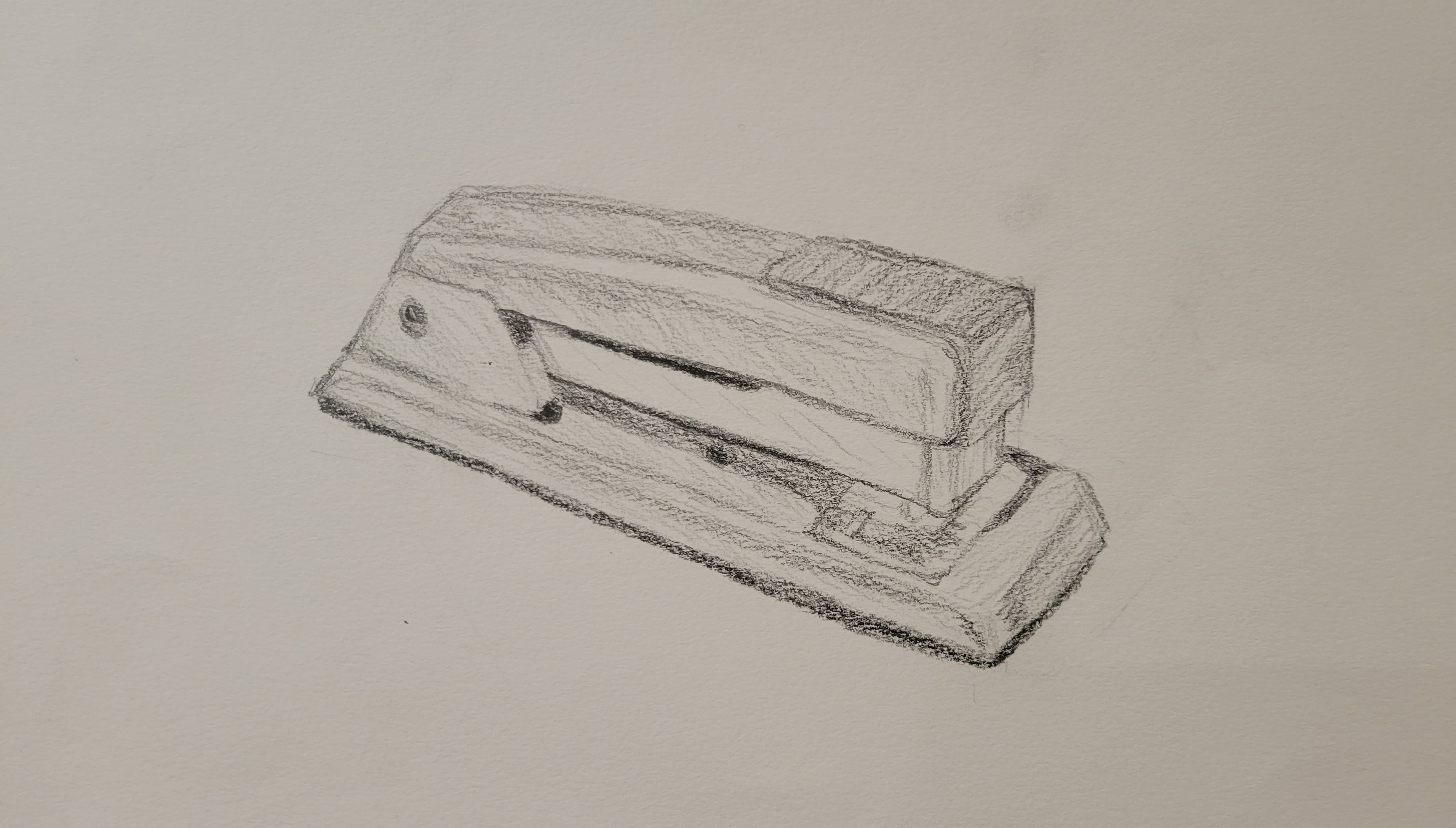 a sketch of a stapler