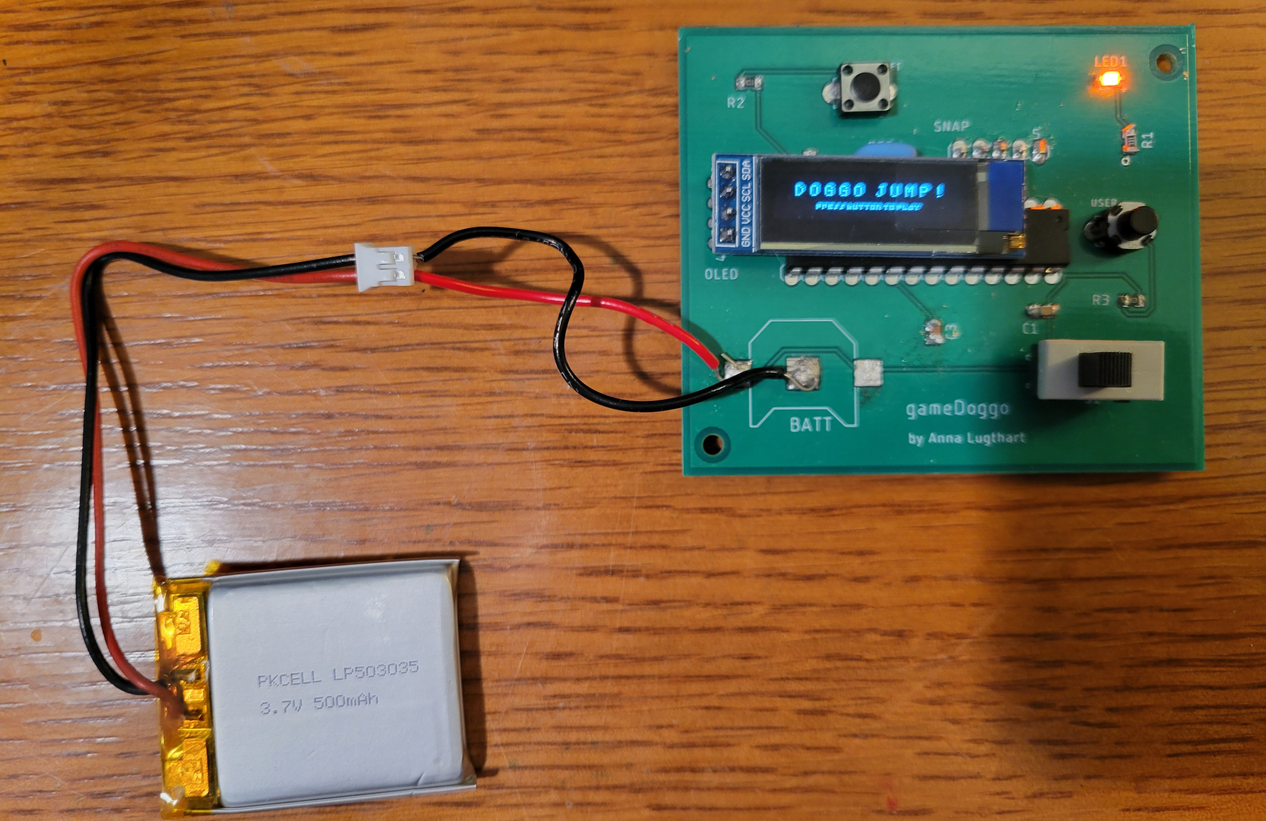 a game PCB powered by a LiPo battery, on