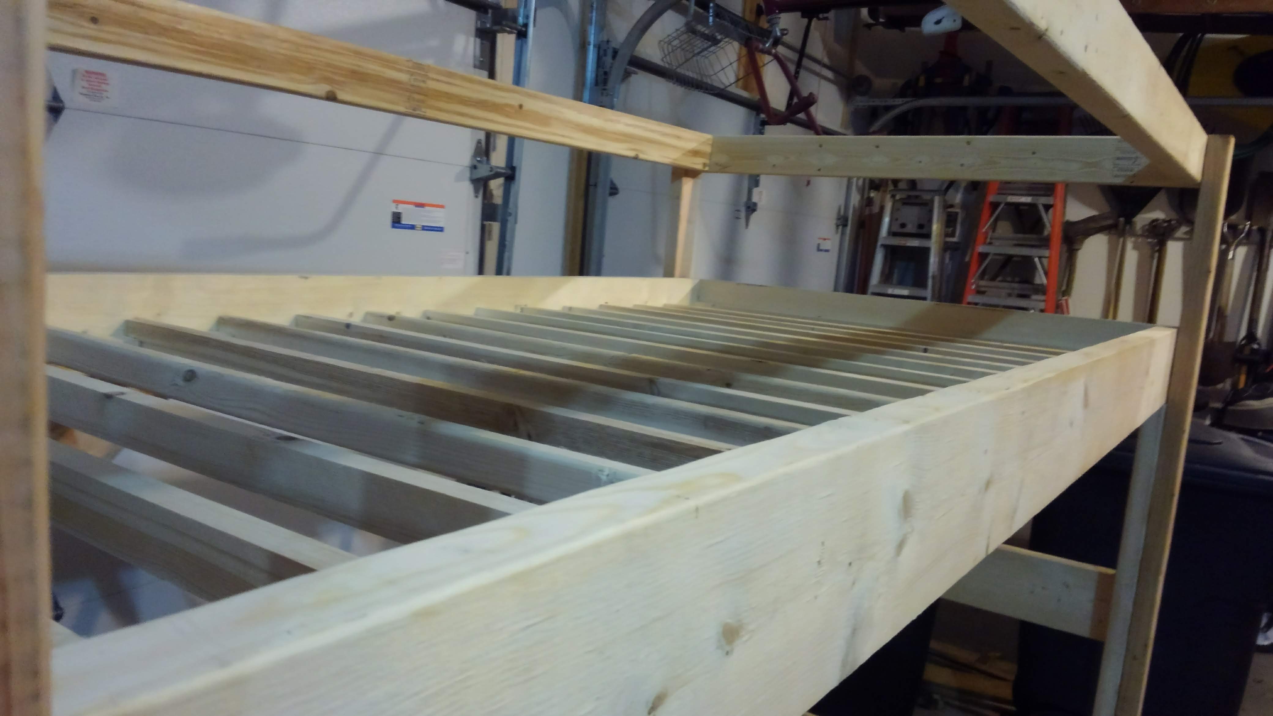 a lofted bed frame