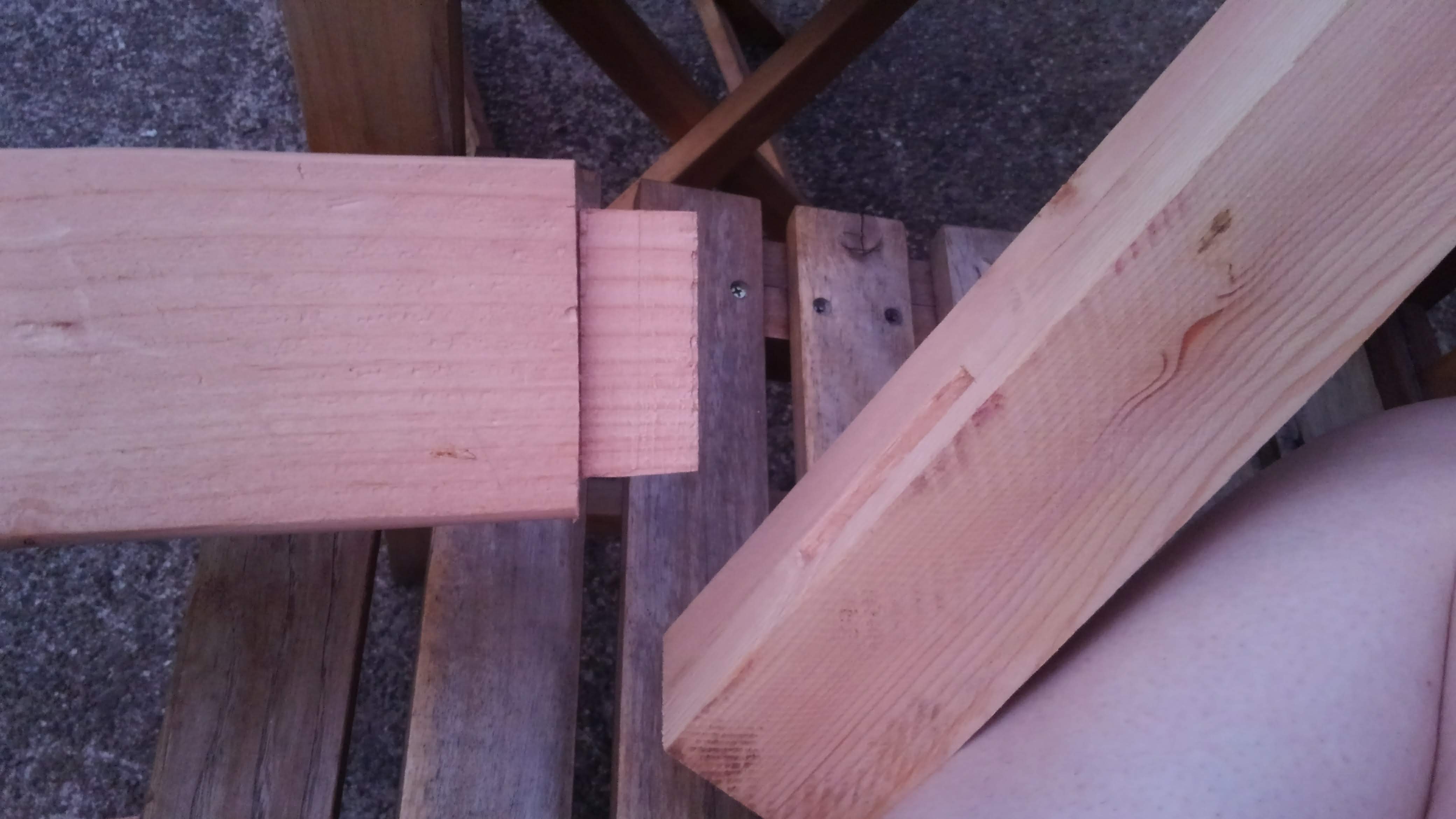 two pieces of wood, one with a tenon and the other with a mortise