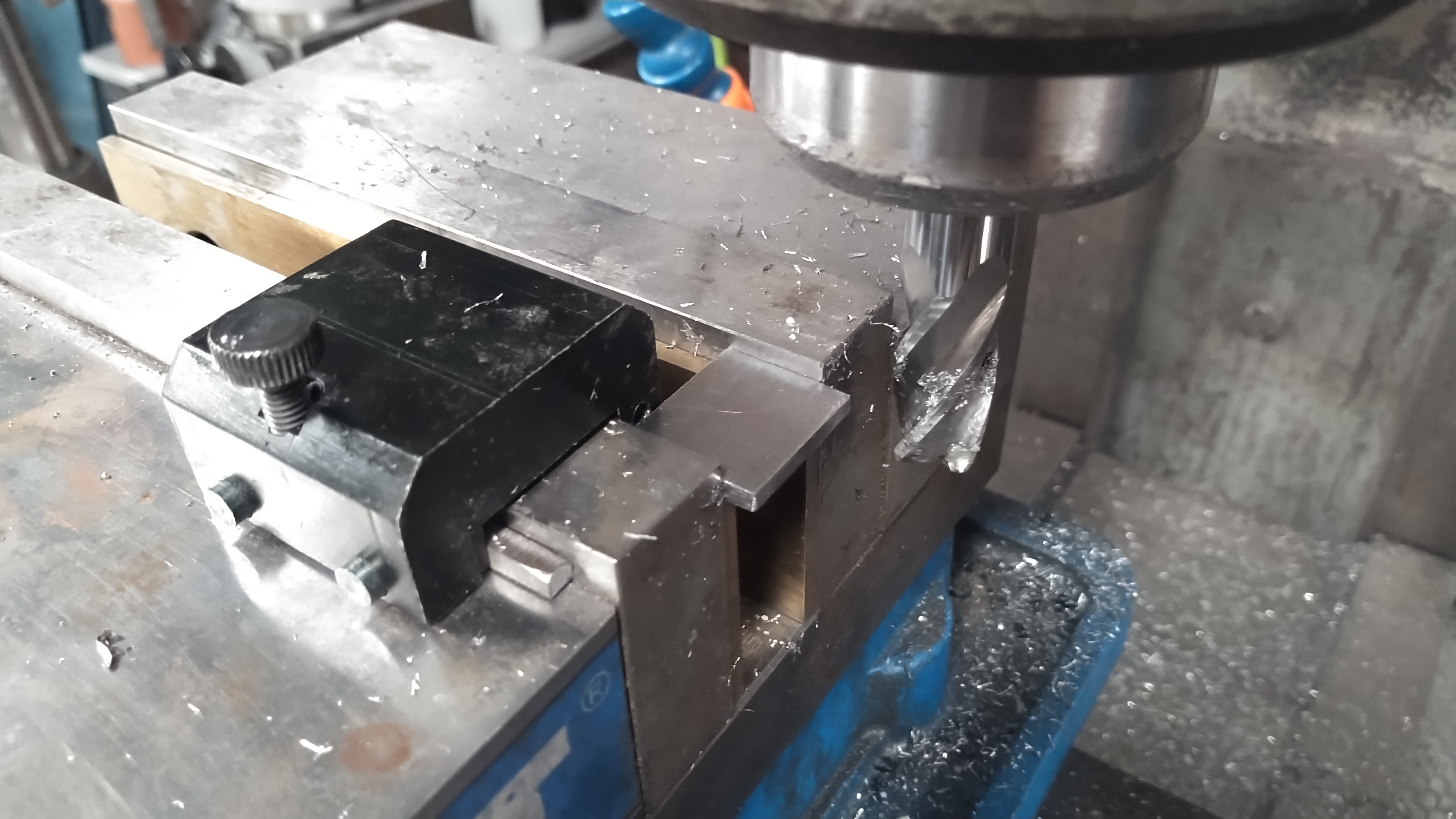 a piece of steel in a milling machine